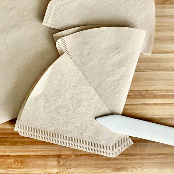 gefaltete Kaffeefilter, Falzbein