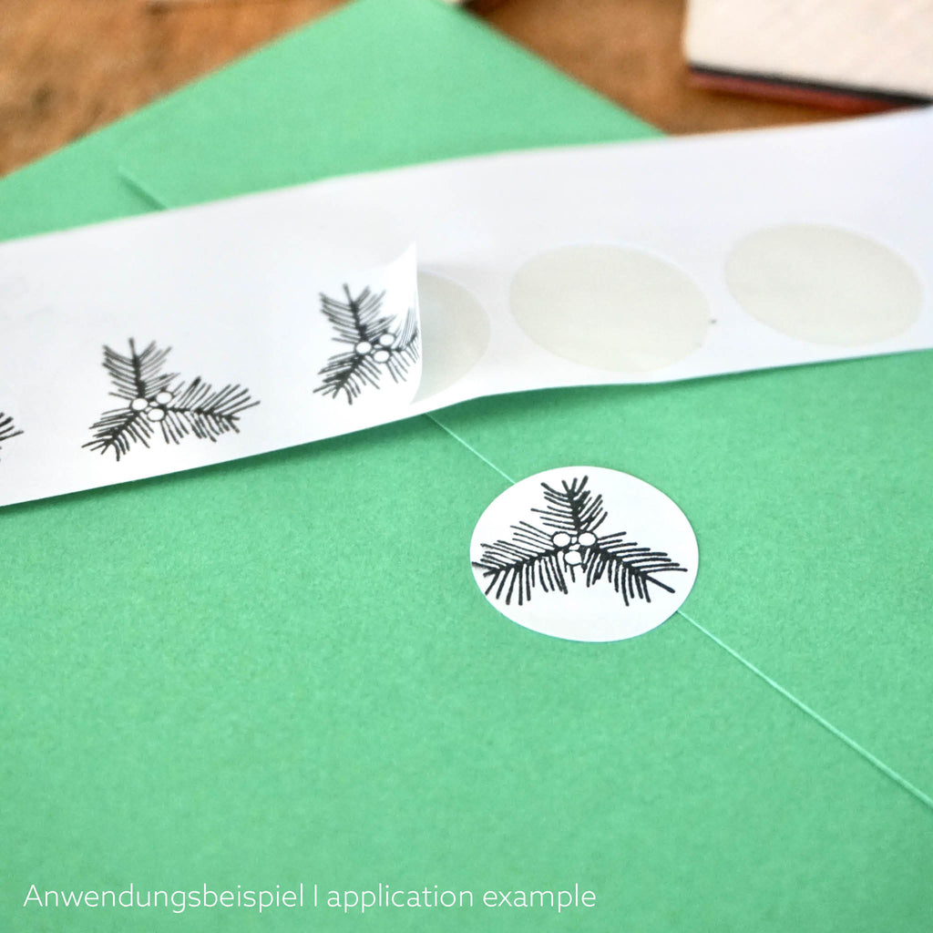 8 Holzstempel mit weihnachtlichen Motiven: Anwendungsbeispiel: lebepunkte bestempeln und damit Umschläge schließen.