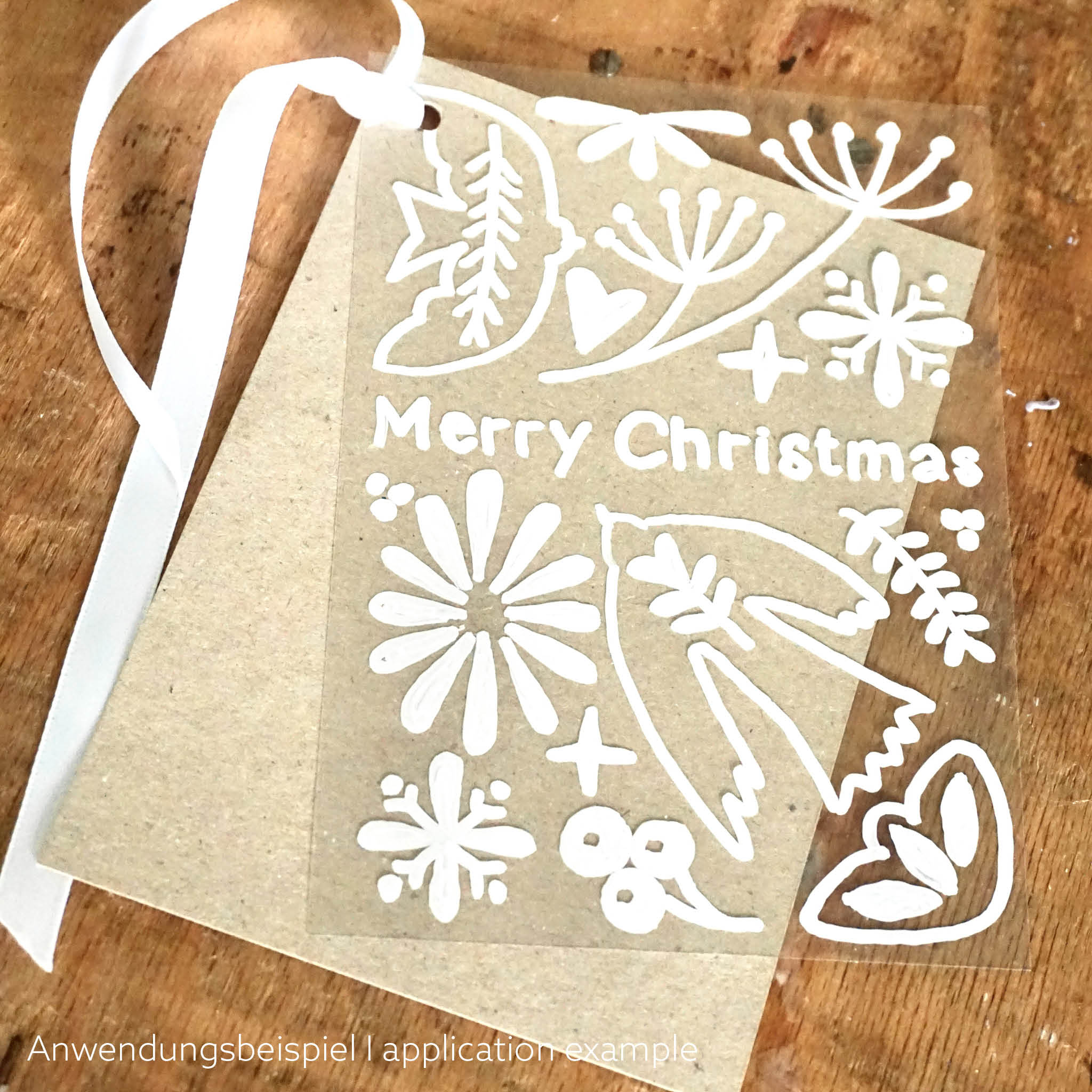 DIY Weihnachtskarten - Beispiele gemischtem Motiv . in diesem Bild sieht man deutlich die zwei Lagen der Karte (Kraftpapier und Folie)